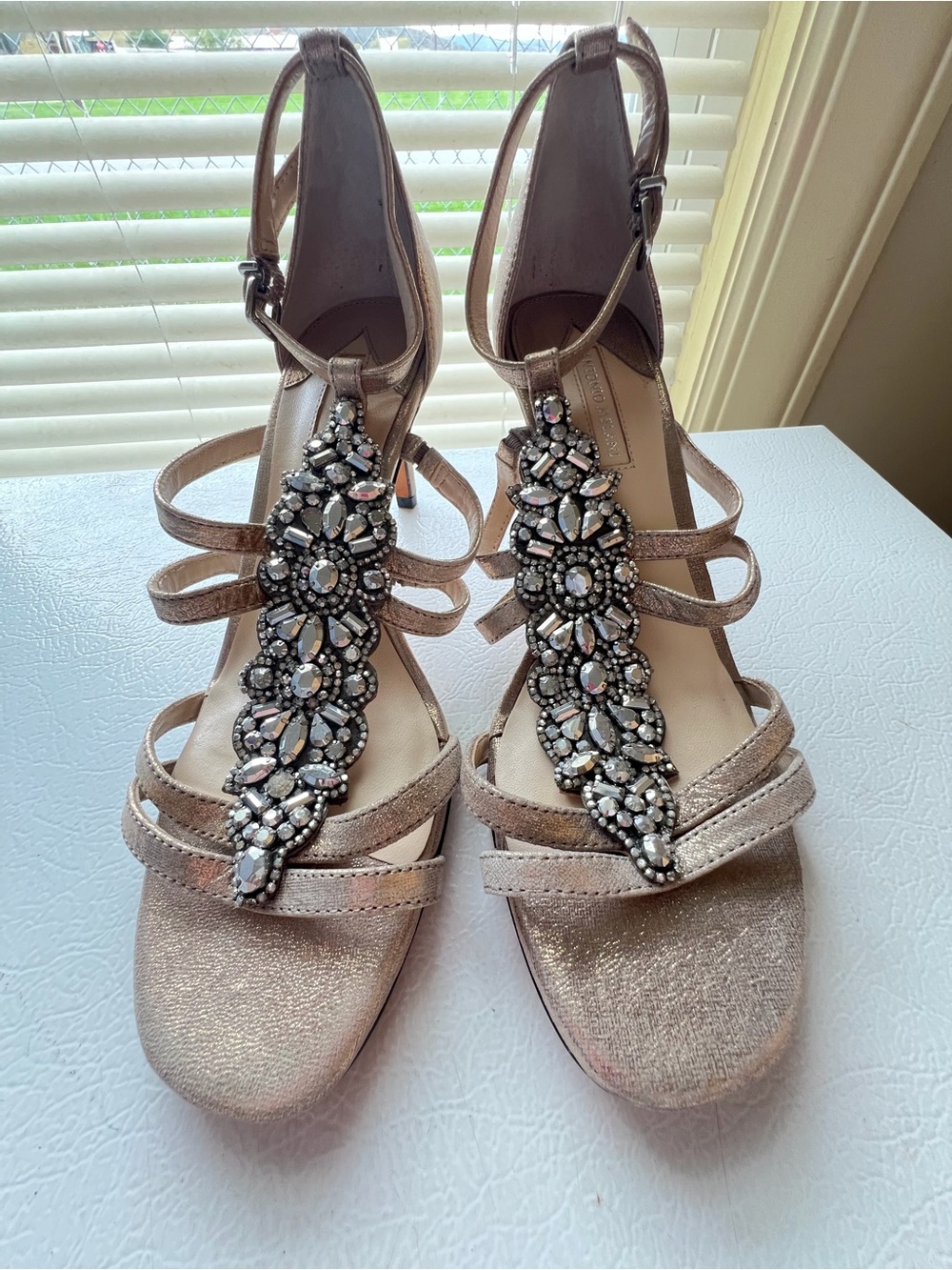 ANTONIO MELANI Metallic Rose Gold Jeweled T-Strap Heels